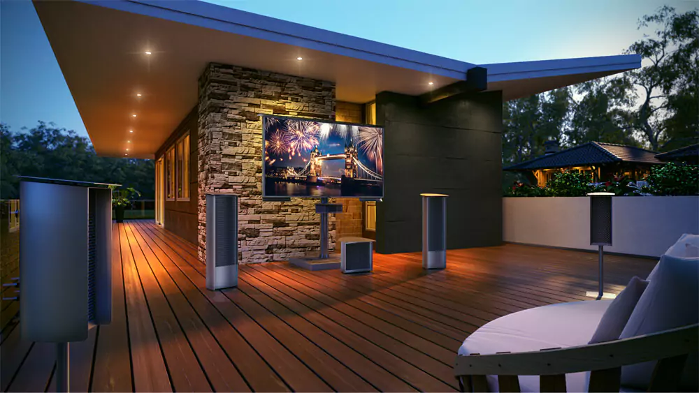 A stone base stand outdoor TV with a soundwave theater system in a wooden patio in Oman.