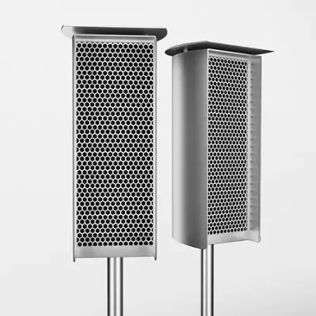 Two stainless steel side speakers in a white space for a quality audio from Dubai.